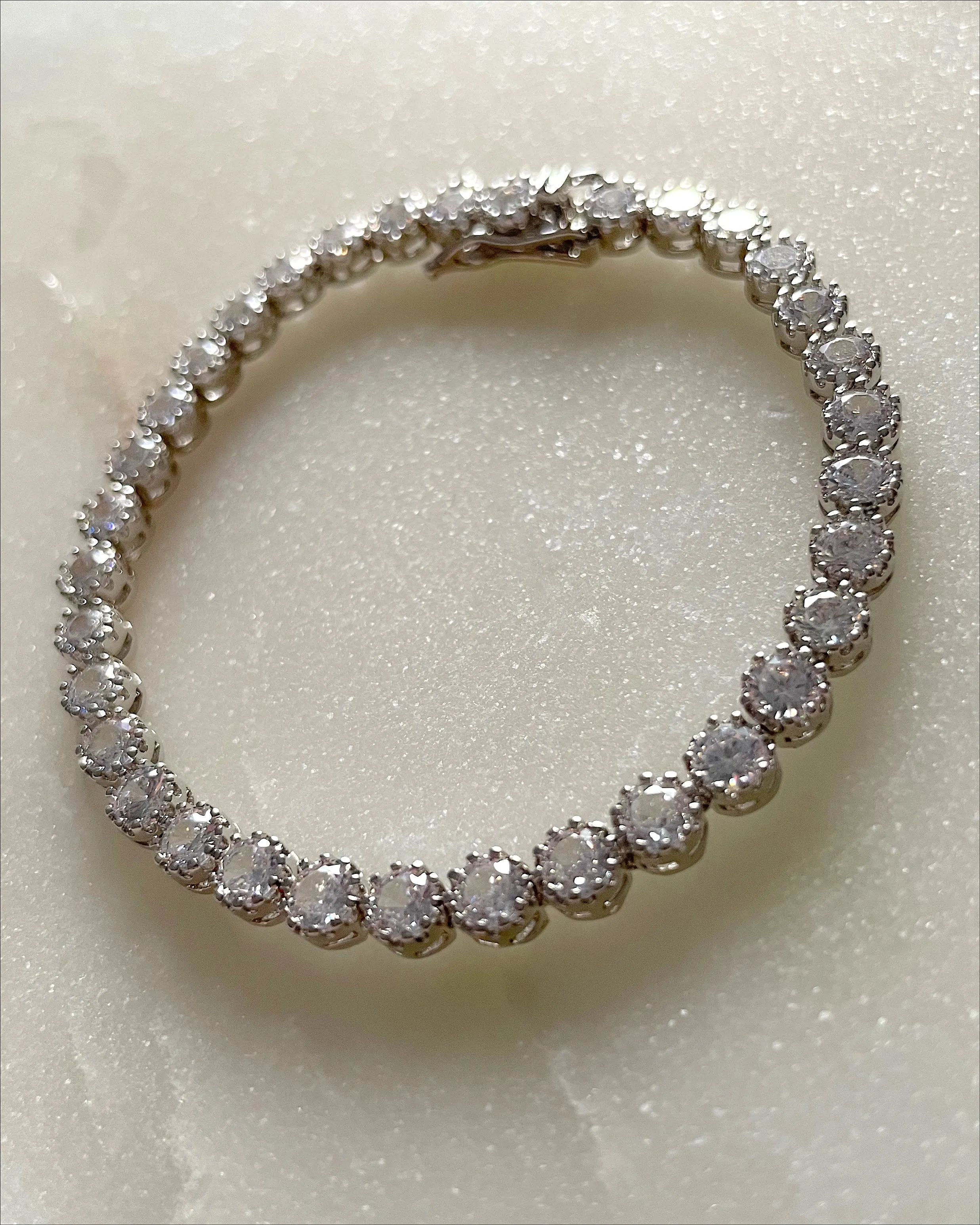 Round tennis bracelet